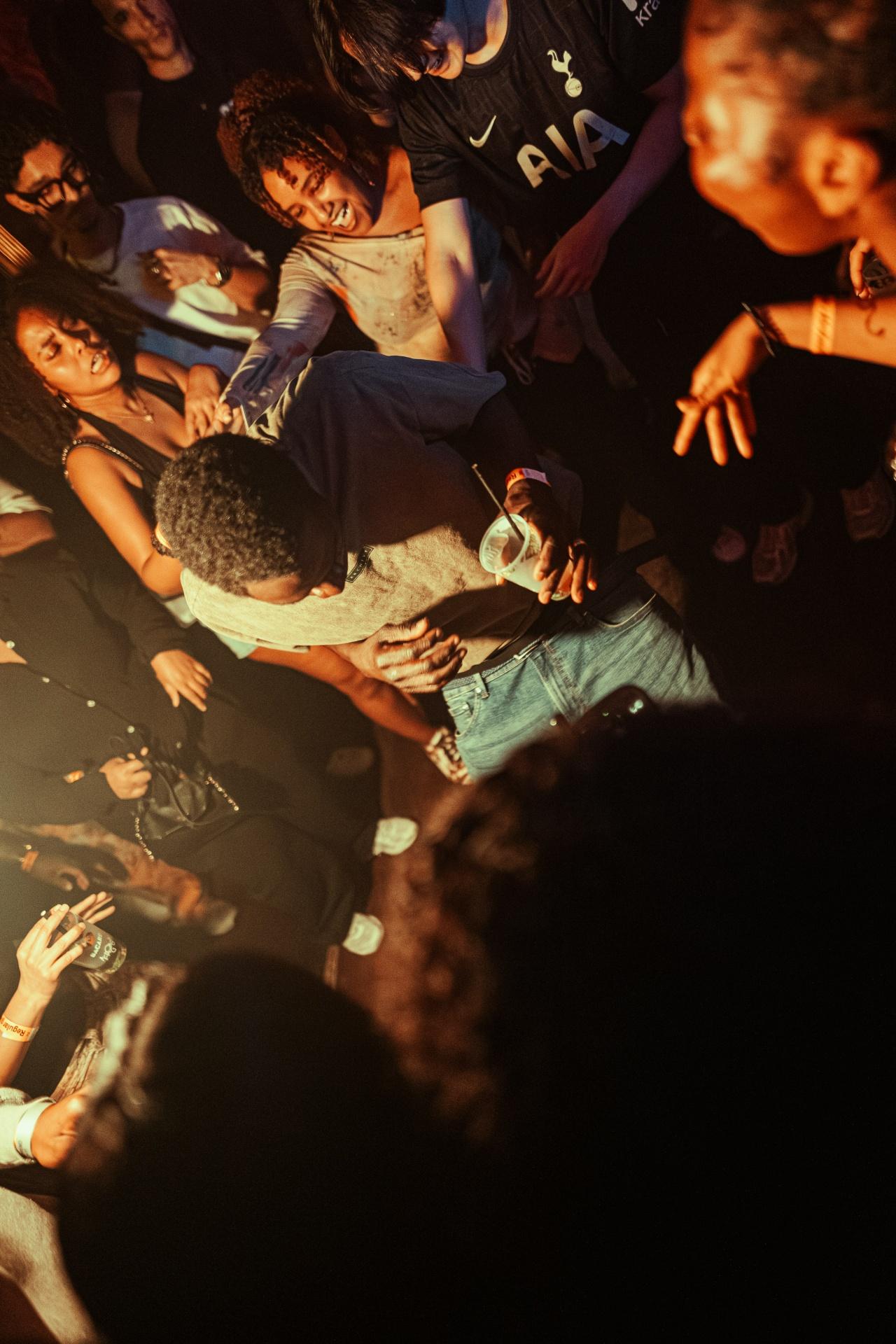 Energetic dancefloor at AfroGasm Afro nightlife event